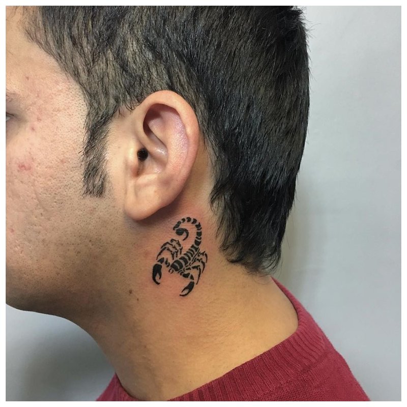 Scorpio - tattoo on the neck of a man