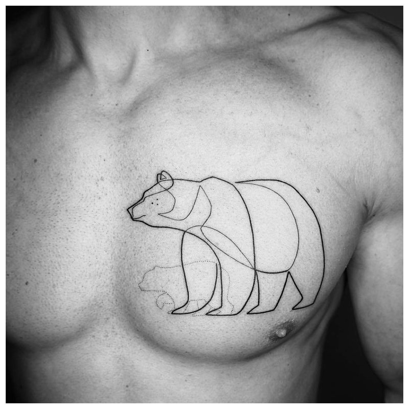 Animalistic tattoo on the chest of a man