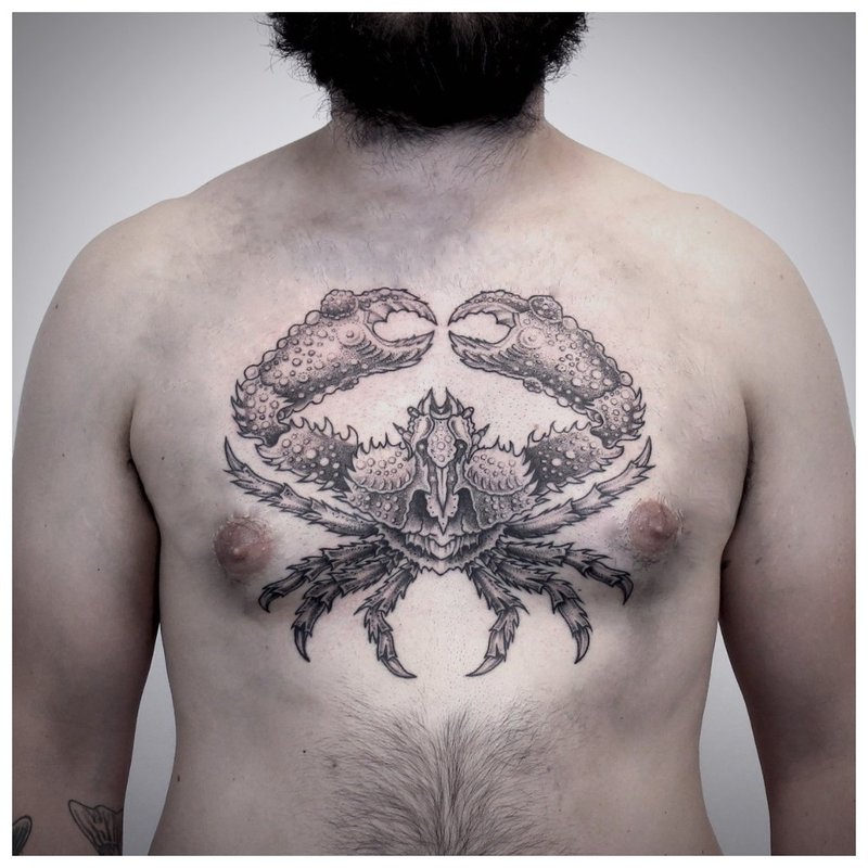 Tattoo on the chest of a man in the style of do-gooder