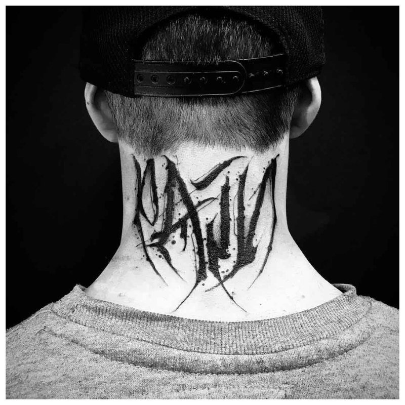 Large inscription - tattoo on the neck of a man