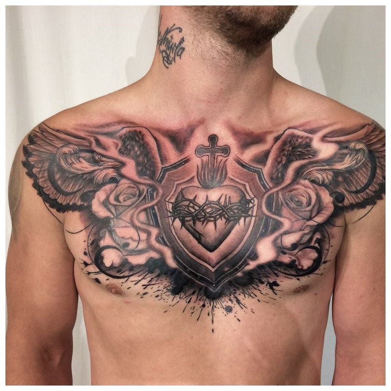 Unusual floral tattoo on the man’s chest